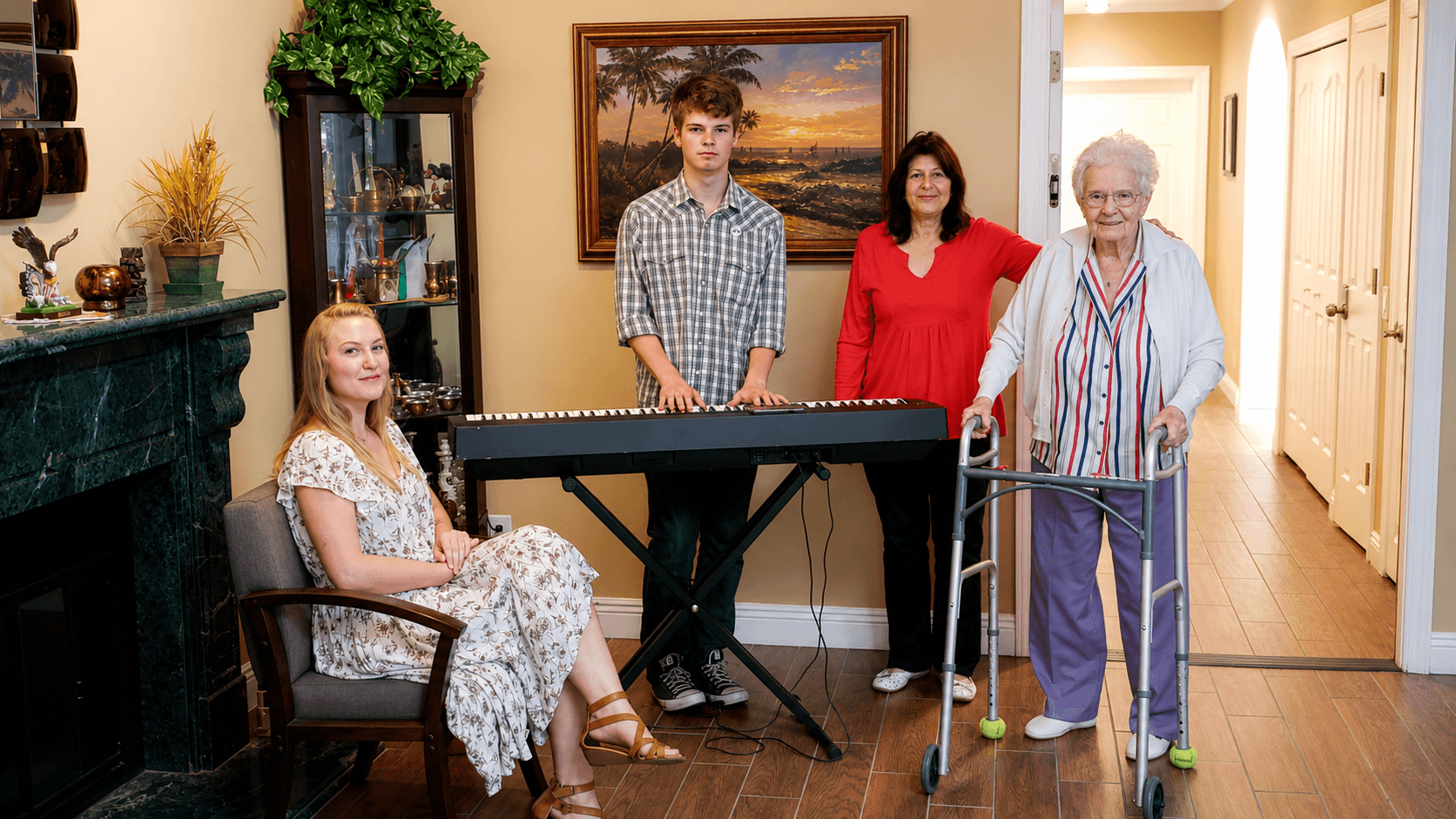 Family and residents gathered around piano at The Oaks at Garfield